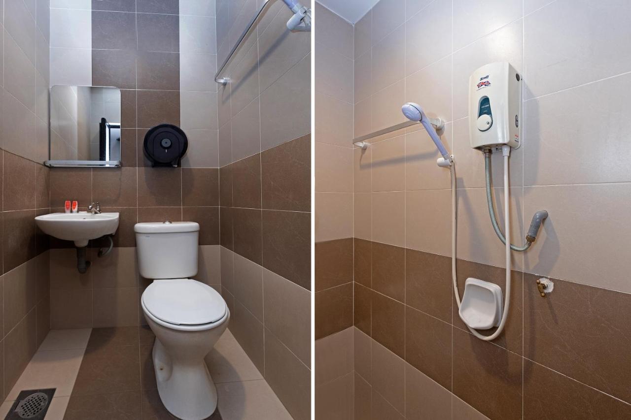 Oyo 90050 V Hotel Телук-Интан Экстерьер фото